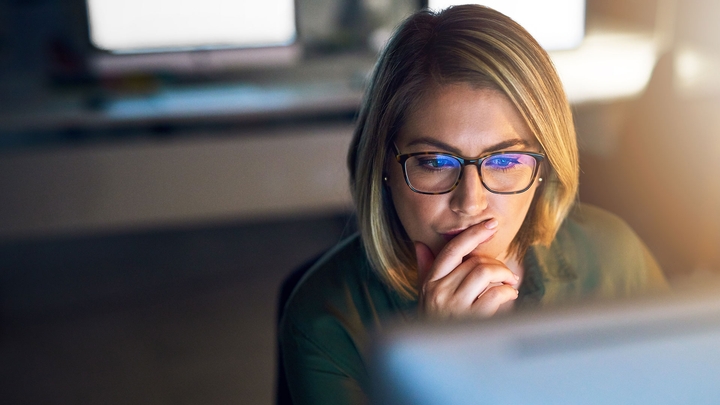 Person looking intensely at monitor